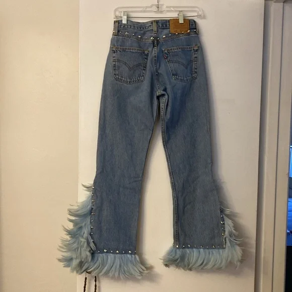 Vintage Levi’s redesign by Charlotte f with real feather detail o de legs sides